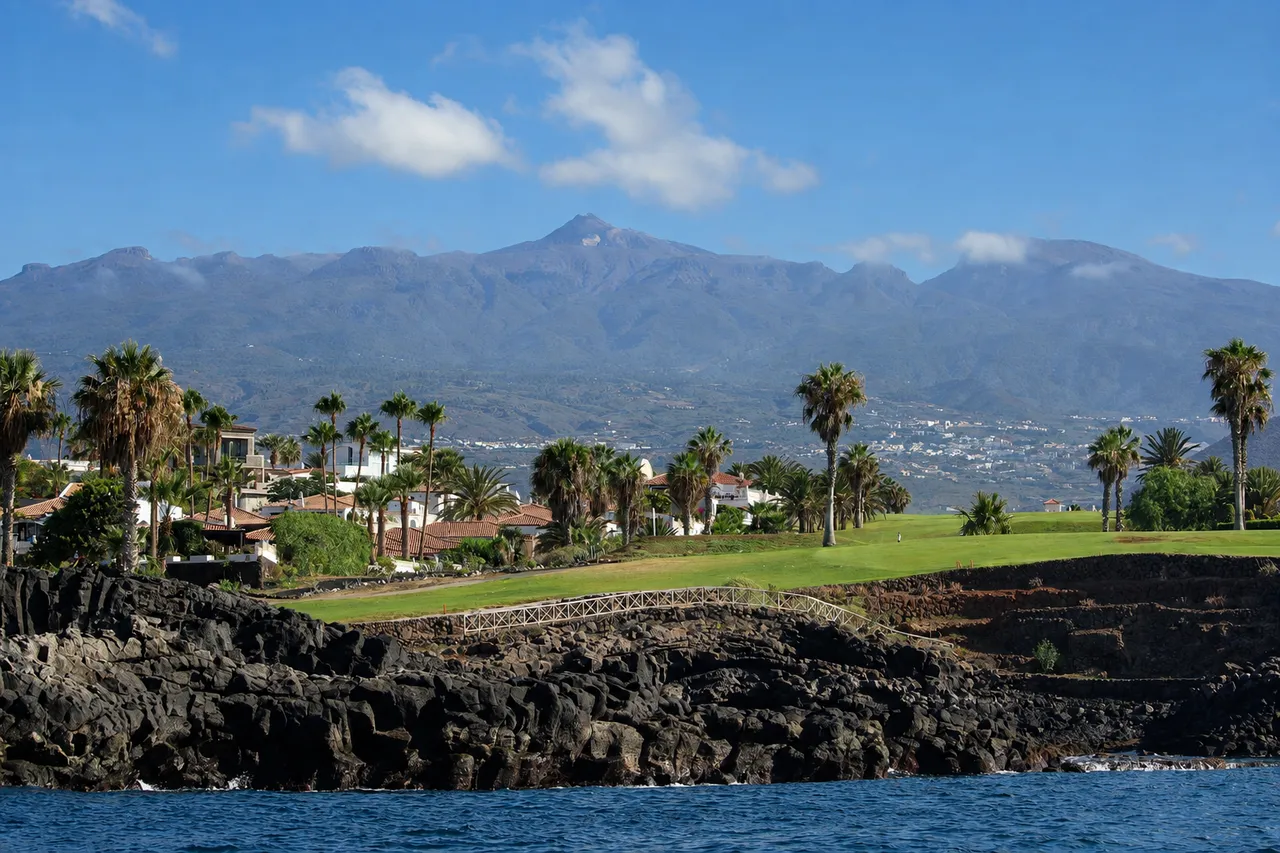 The golf course above the marina with Teide in the distance